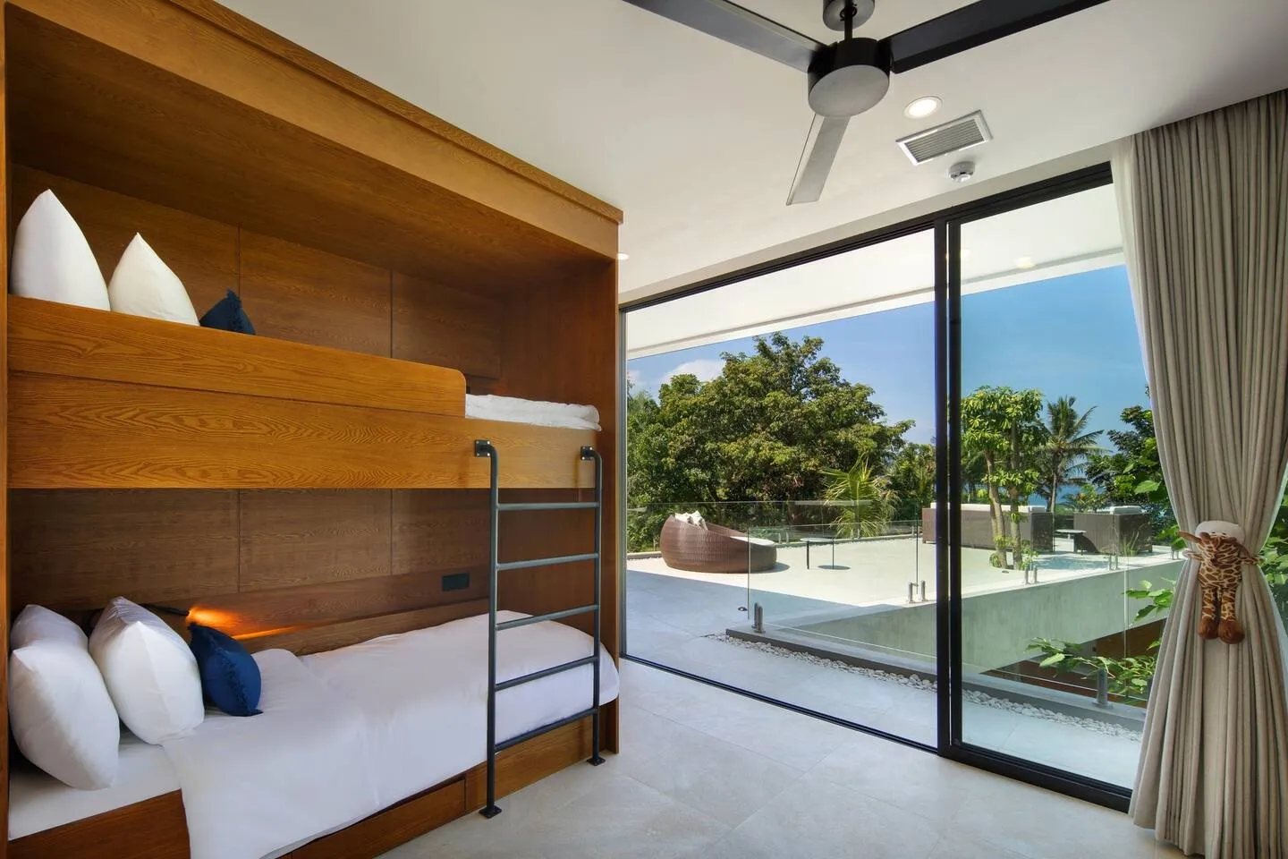 Villa Serangan bedroom with wood feature wall