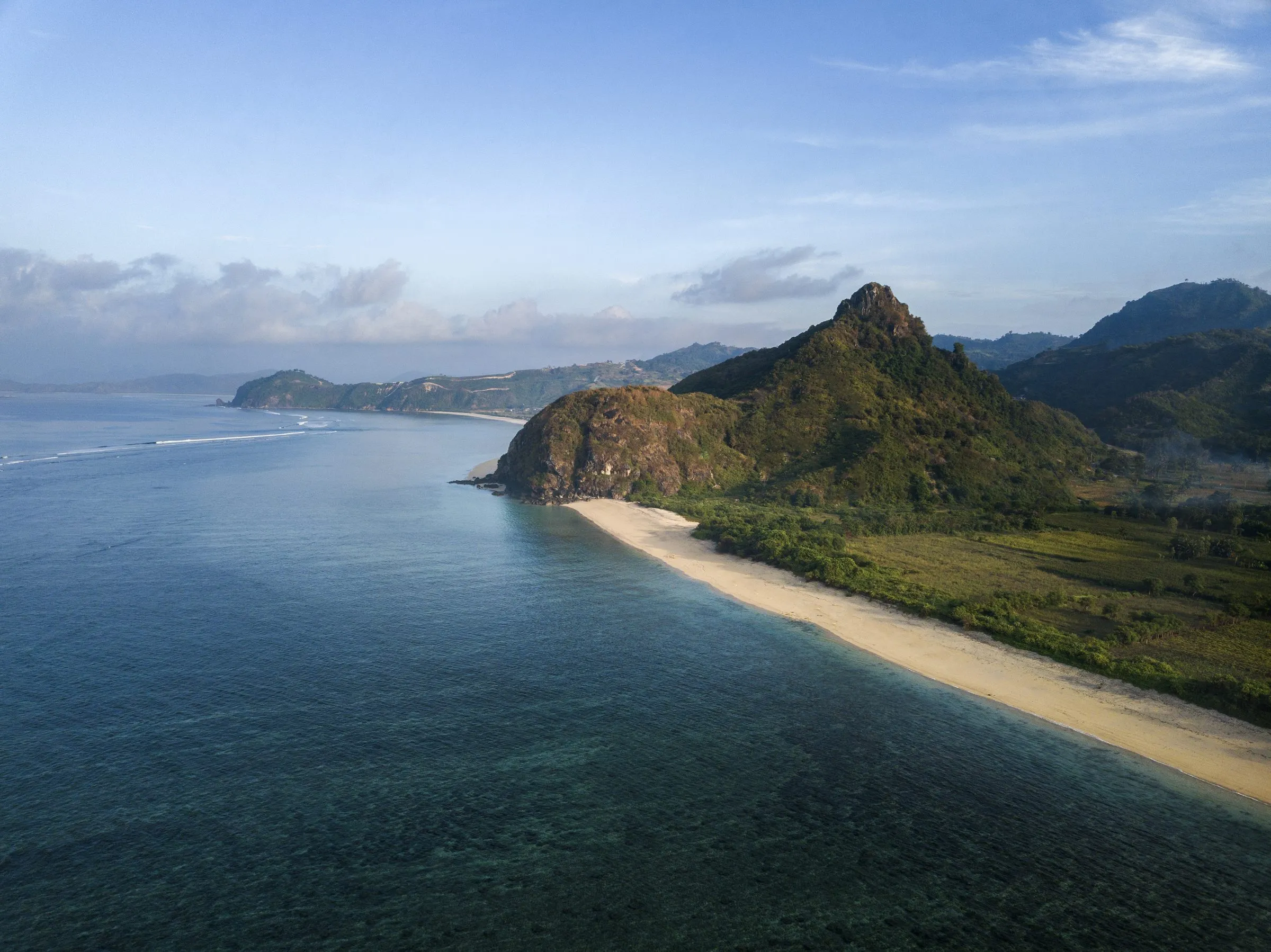 Selong Belanak beach with hills behind, South Lombok